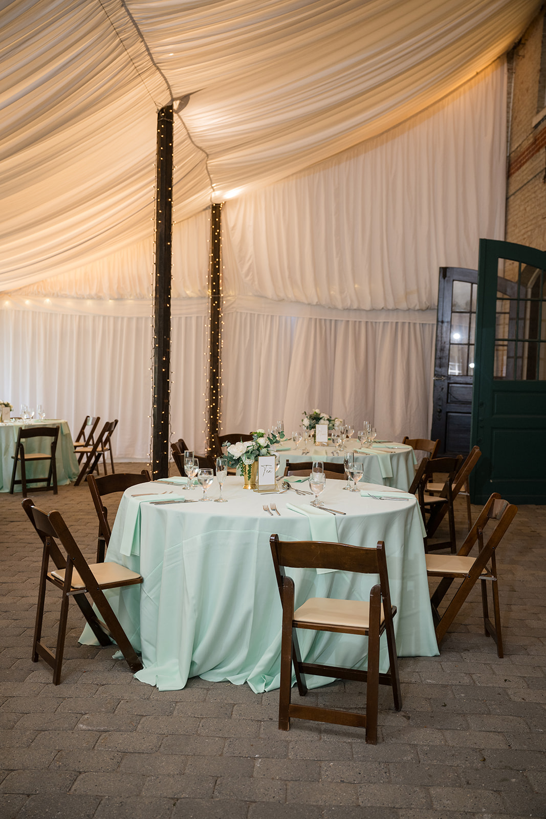 Katie & Rachel's guest tables in the half tent.