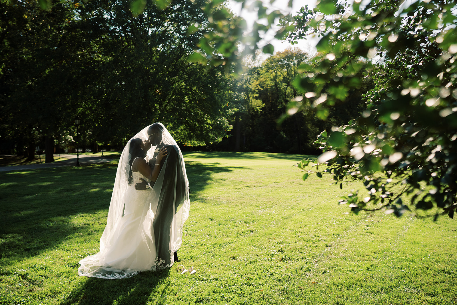 Brandon & Olivia under her veil.